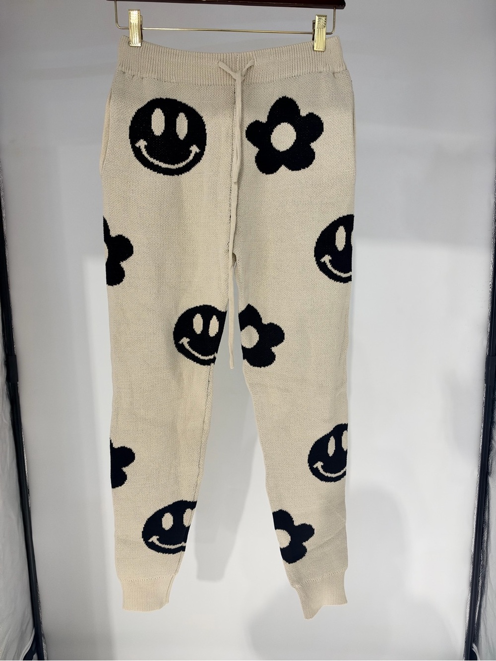 Beige Knit Joggers with Black Smiley & Flower Motif
